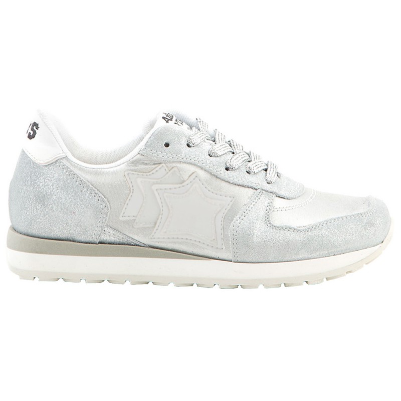 white sneakers with silver stars